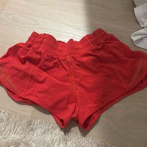 red/orange lululemon hotty hot shorts 2.5 size 4